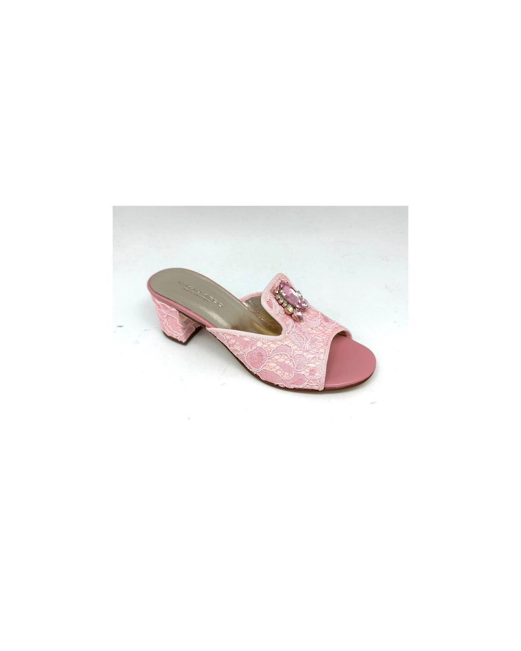 Pink Lace Kitty mules Only a few pairs available — sell out fast!
As seen in LFW SS26